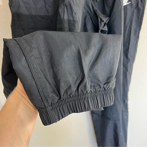 NWT Men’s Nike woven nylon tapered track pants standard fit sz XXL black active - Picture 8 of 14